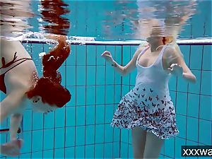 hot Russian dolls swimming in the pool
